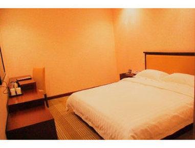 Super 8 by Wyndham Guannan Xin Dong Nan Lu à Xinan Town, CN