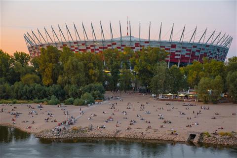 Beach on the Vistula river and “PGE Narodowy” Stadium